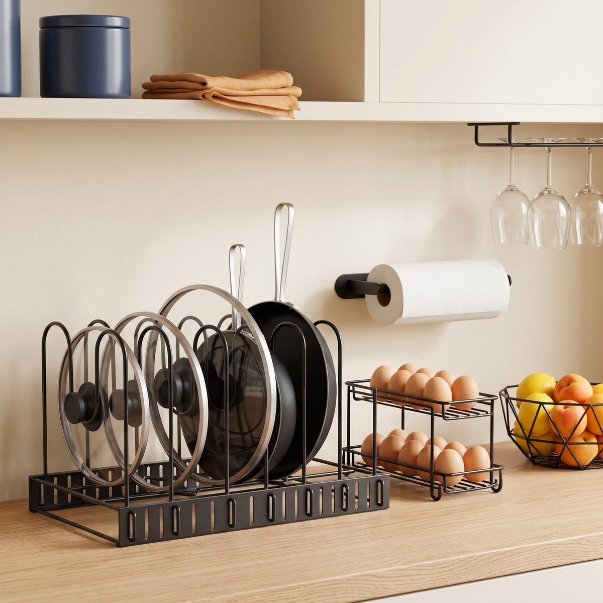 Kitchen storage racks holding pans, eggs and glasses